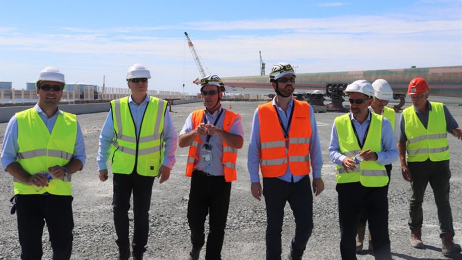 RLM auditors walking a client site with the project team