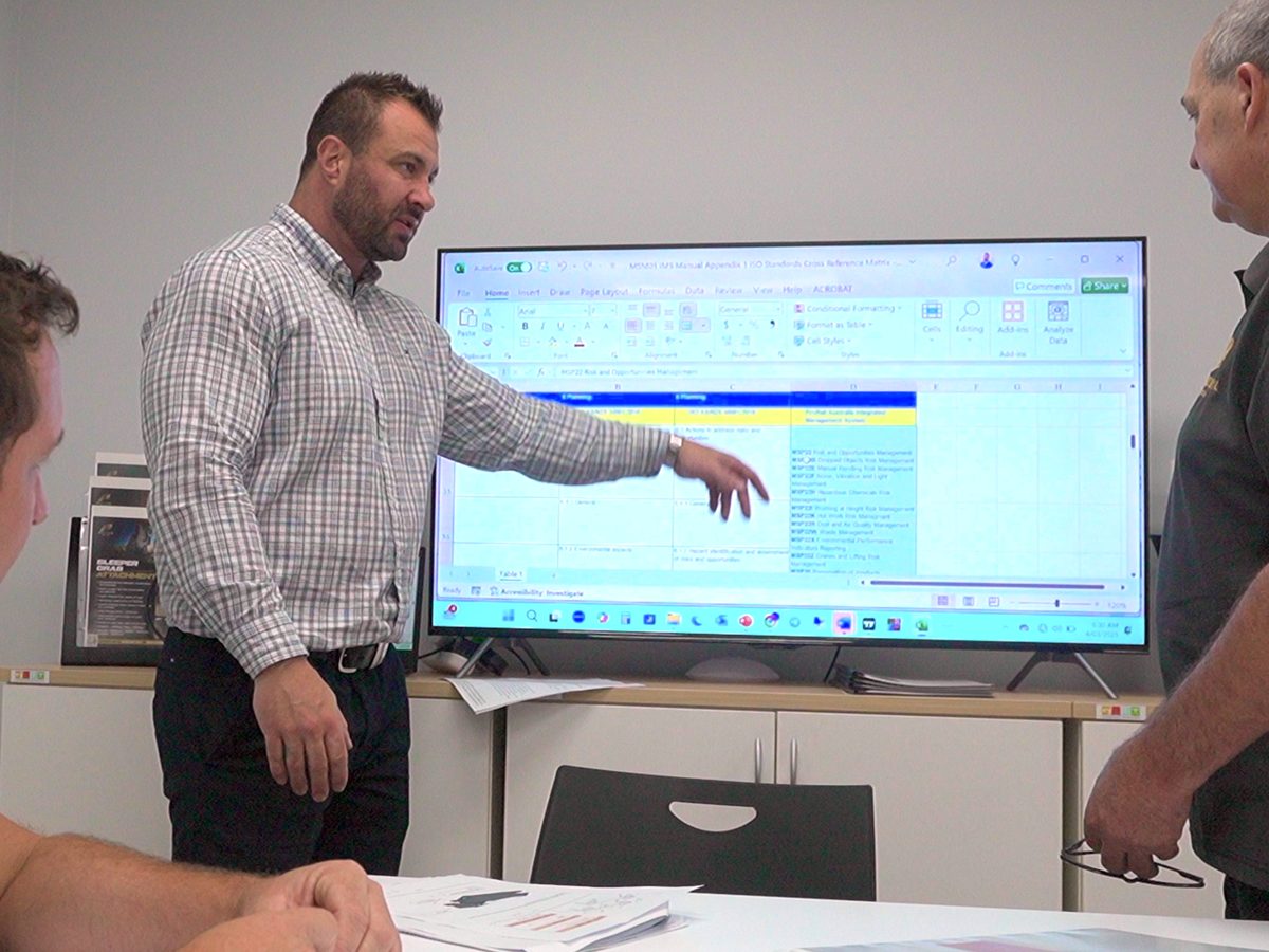 Raphael La Marra presenting the compliance matrix to a client ahead of their Stage 1 audit